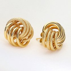 Złote kolczyki węzeł – elegancka biżuteria dla kobiet