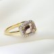 Pierścionek z morganitem i brylantami w żółtym złocie – elegancja i blask