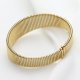 Elegancka Złota Bransoleta Sprężynowa - Klasyka w Nowoczesnym Wydaniu