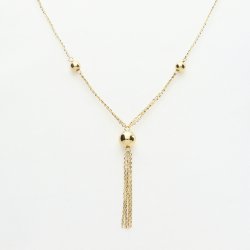 Elegancki złoty naszyjnik z frędzlami – subtelna biżuteria z łańcuszkiem i kulkami