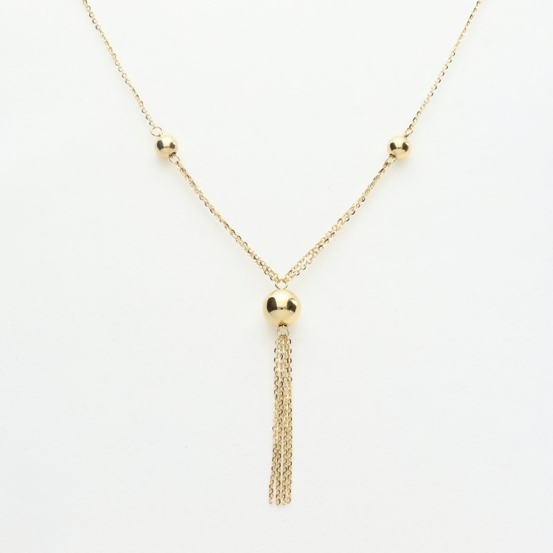 Elegancki złoty naszyjnik z frędzlami – subtelna biżuteria z łańcuszkiem i kulkami