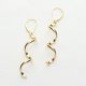 Długie Złote Kolczyki Spirale - Nowoczesna Biżuteria Damska