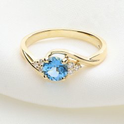 Złoty Pierścionek z Błękitnym Topazem i Diamentami – Wyjątkowa Elegancja