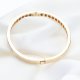 Złota Sztywna Bransoleta – Klasyczna Elegancja z Geometrycznym Akcentem