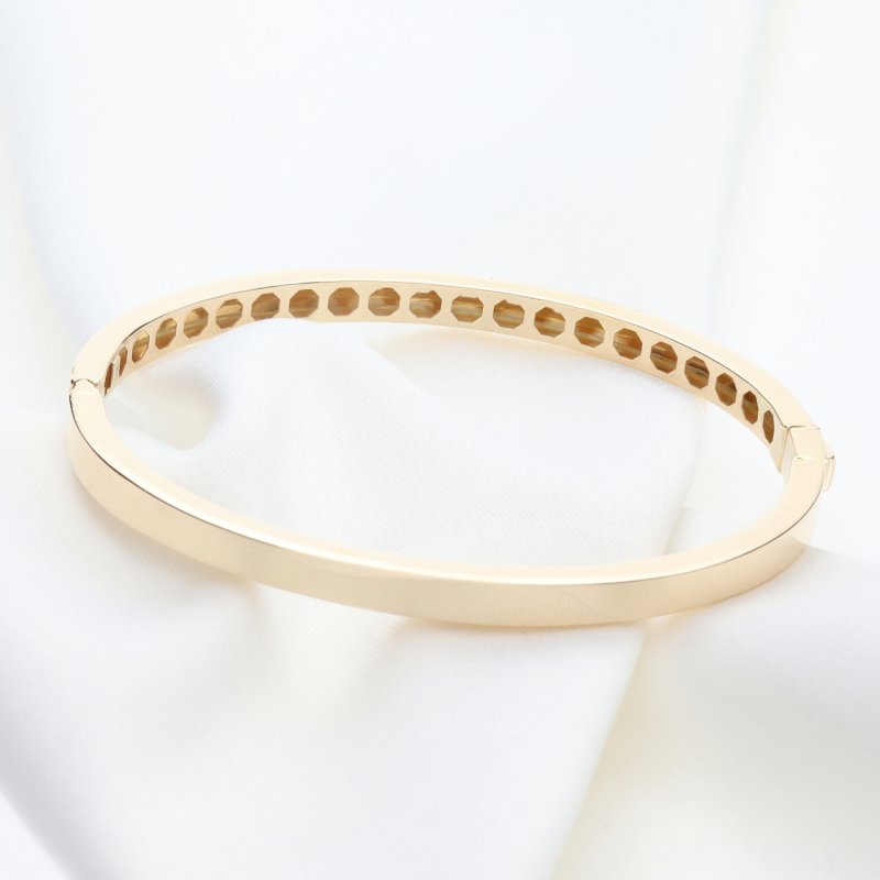 Złota Sztywna Bransoleta – Klasyczna Elegancja z Geometrycznym Akcentem