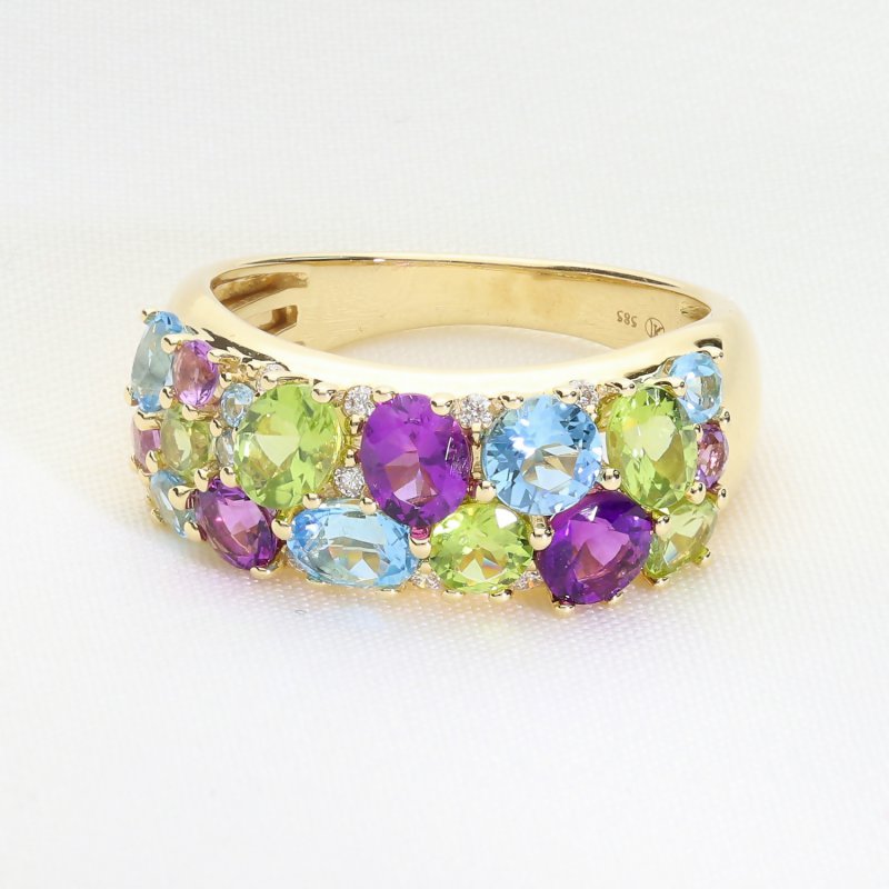 Ekskluzywny złoty pierścionek wysadzany ametystami, topazami, oliwinami i brylantami
