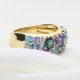Ekskluzywny złoty pierścionek z tanzanitem, topazami i brylantami