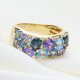 Ekskluzywny złoty pierścionek z tanzanitem, topazami i brylantami