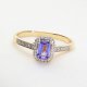 Klasyczny złoty pierścionek z naturalnym tanzanitem i brylantami
